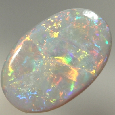 SOLID SEMI BLACK OPAL Bright rolling flashes, red, neon yellow and green